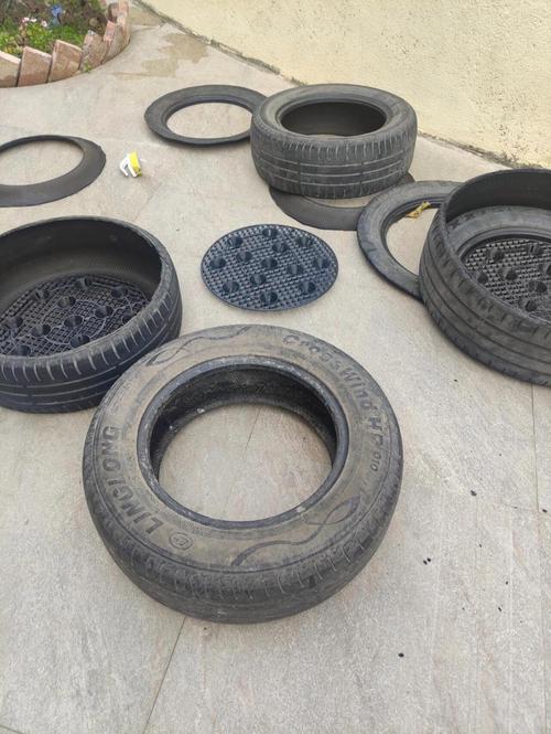 旧轮胎做花盆图片大全,如何用旧轮胎做花坛图片